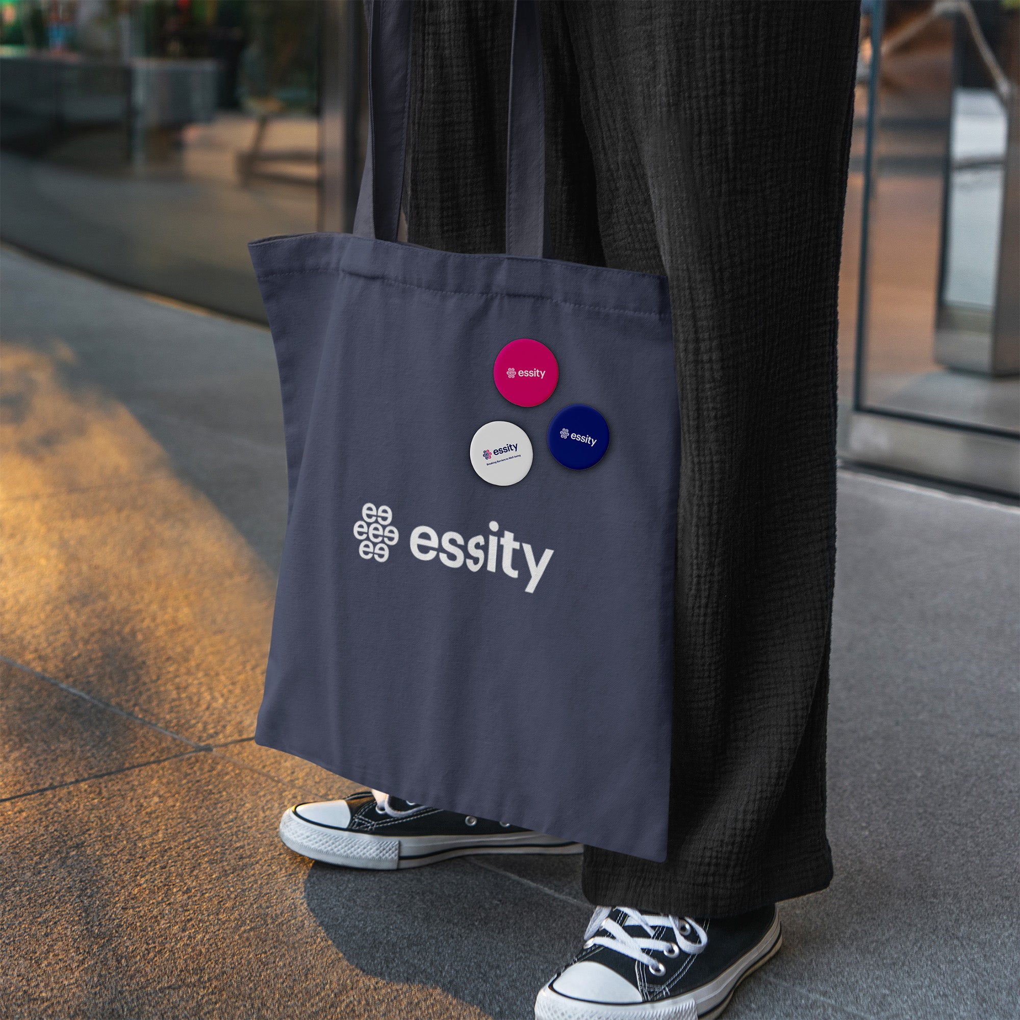 essity pins in white, magenta and purple